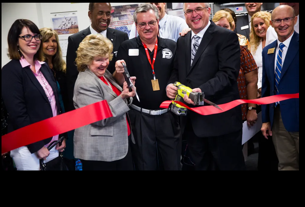 Front page of the Naples Daily News featuring Todd Pree at the official grand opening of a retail store he founded and owned, highlighting his impact on business and innovation.